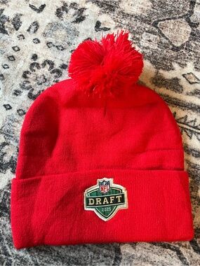 NFL Green Draft Patch Beanie on Red Knit